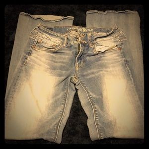 Light wash boot cut jeans.